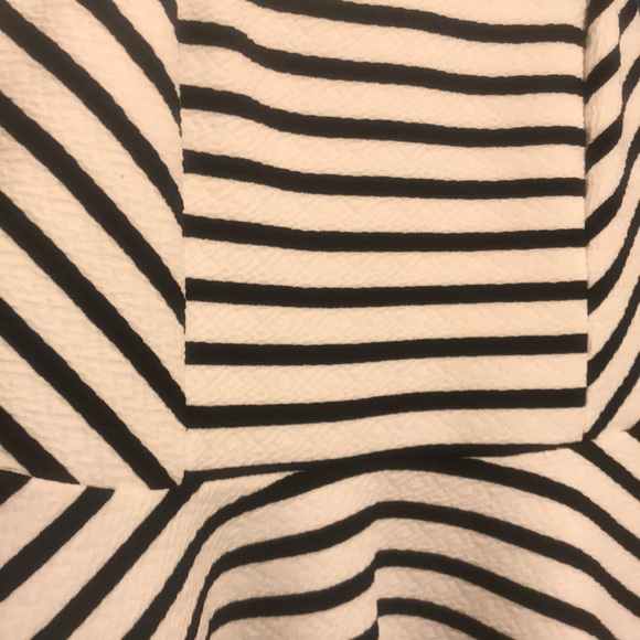 Sleeveless Peplum Top - Picture 3 of 7